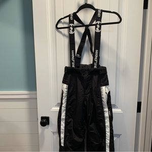 Wedze snow gear. Youth size 12. Black white and red. Velcro’s suspenders/straps.